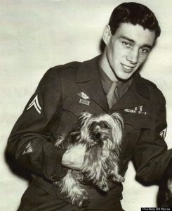 Photo of Smoky being held