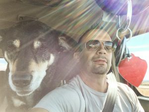 dog and man road trip heart