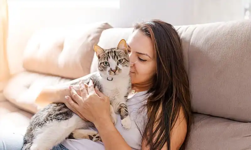 A woman with her cat